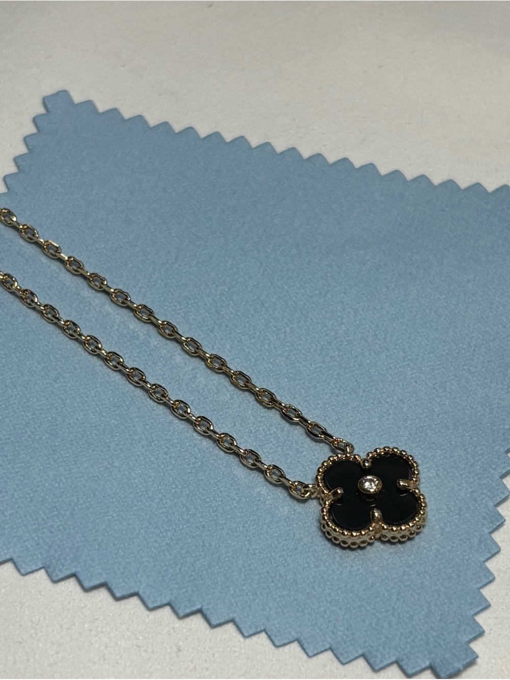 Gold Chain Necklace with Black Clover Pendant